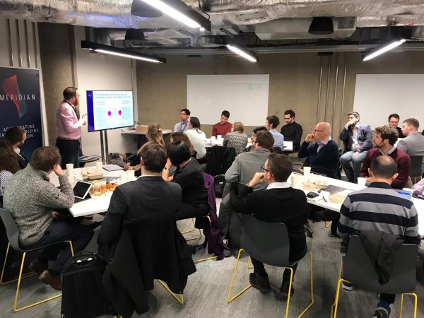 The Zenzic team sitting in a workshop, discussing the roadmap